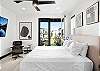 Unwind in this spacious king bedroom with a Smart TV—comfort and entertainment in one. 