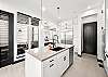 Whip up your favorite meals in this beautifully designed kitchen – includes breakfast bar seating for 3. 