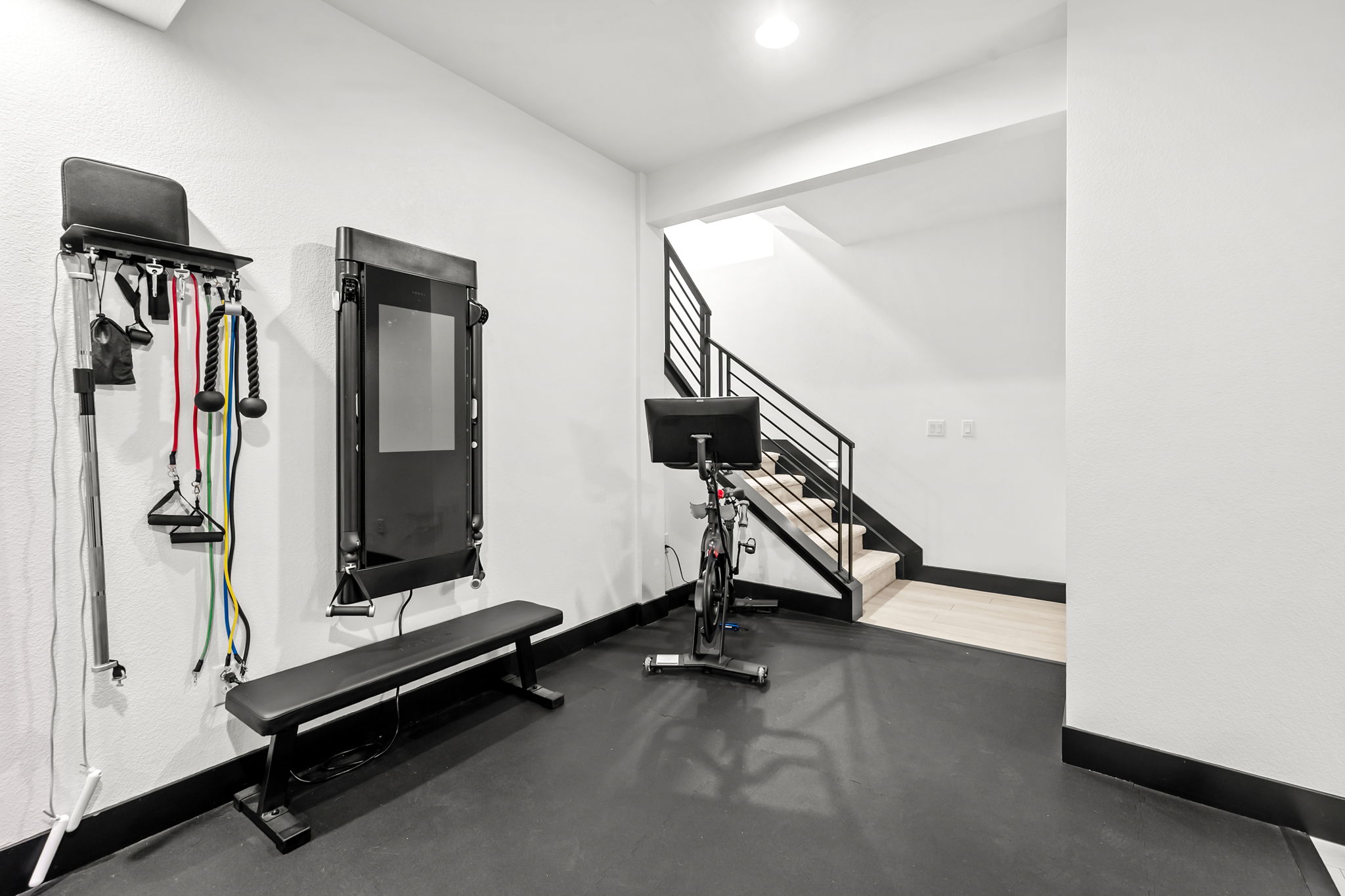 No need to leave the house for your workout! Access our home gym in the basement– includes a Tonal and Peleton (subscriptions included)!