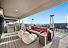 Enjoy a drink around the firepit or fire up the grill and pizza stove located on the rooftop balcony.
