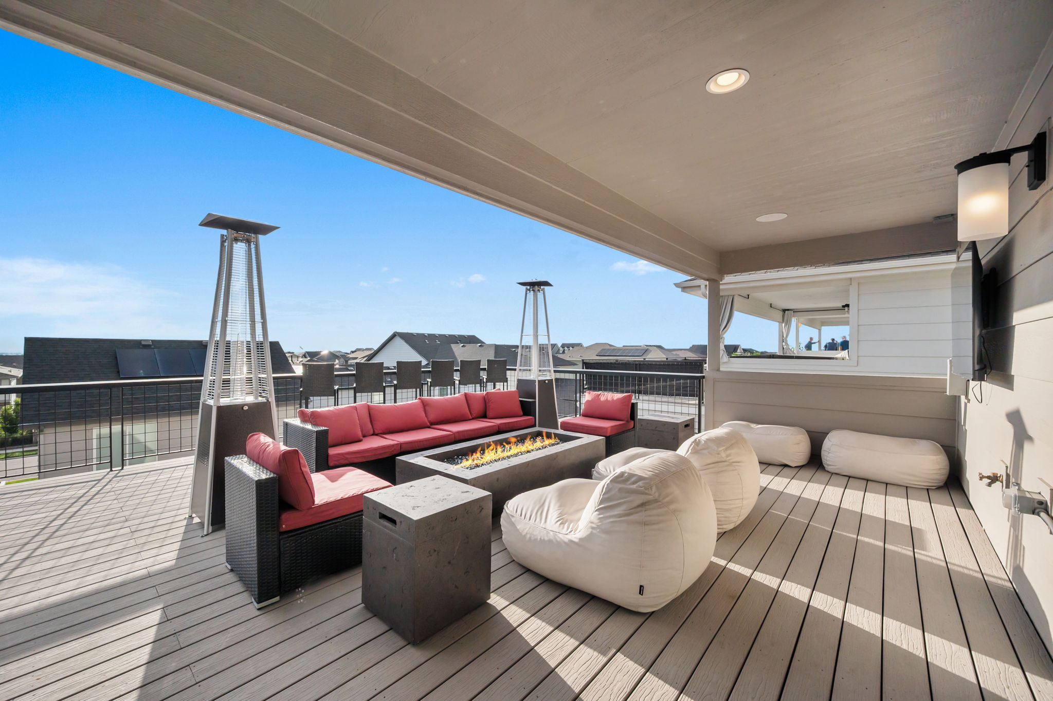 Enjoy a drink around the firepit or fire up the grill and pizza stove located on the rooftop balcony.