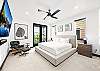 Unwind in this spacious king bedroom with a Smart TV—comfort and entertainment in one. 
