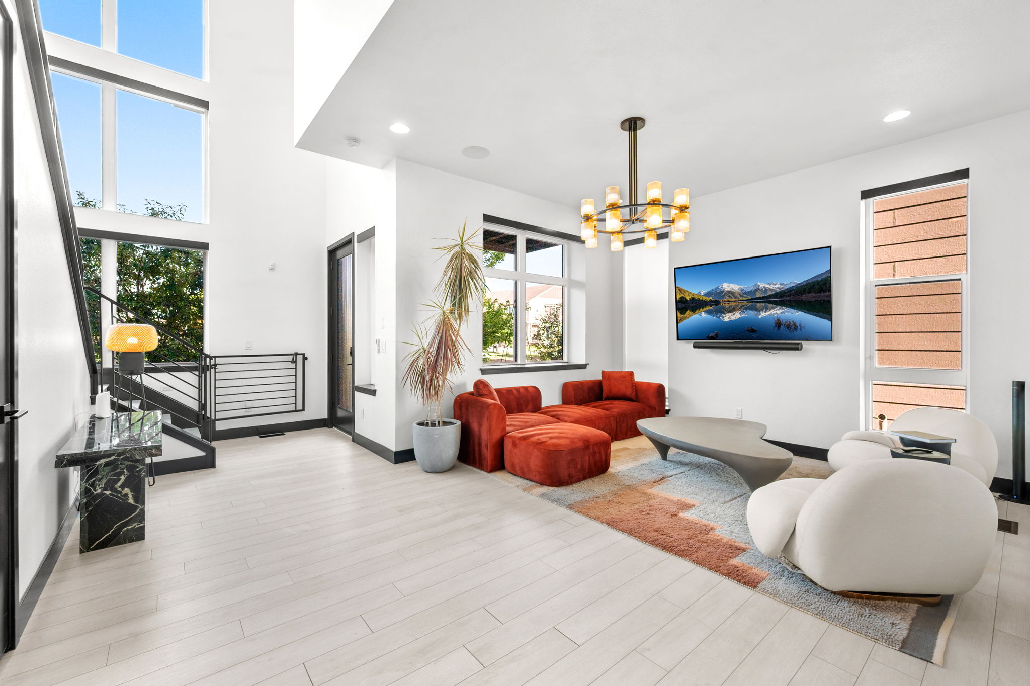 As soon as you enter the home, you are greeted by a designer living room area. 