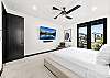 Unwind in this spacious king bedroom with a Smart TV—comfort and entertainment in one. 