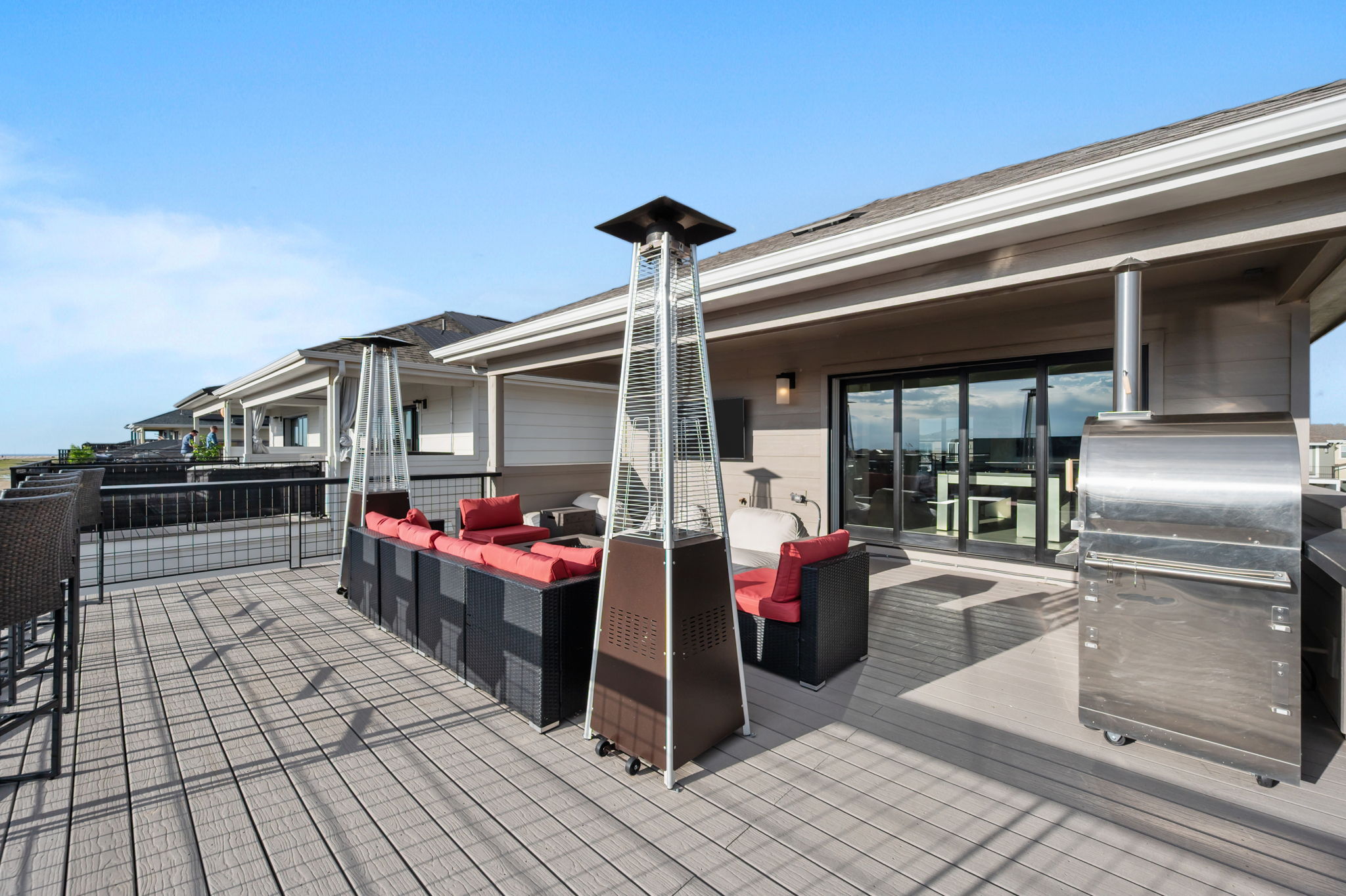 Enjoy a drink around the firepit or fire up the grill and pizza stove located on the rooftop balcony.