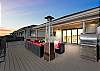 Enjoy evenings around the fire pit on the rooftop balcony. 