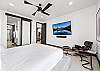 Unwind in this spacious king bedroom with a Smart TV—comfort and entertainment in one. 
