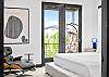 Unwind in this spacious king bedroom with a Smart TV—comfort and entertainment in one. 