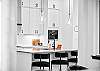 Whip up your favorite meals in this beautifully designed kitchen – includes breakfast bar seating for 3 and a Miele espresso maker.