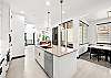 Whip up your favorite meals in this beautifully designed kitchen – includes breakfast bar seating for 3. 
