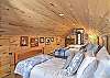 Second-story twin bedroom with three twin beds.  Accessible through the king bedroom.