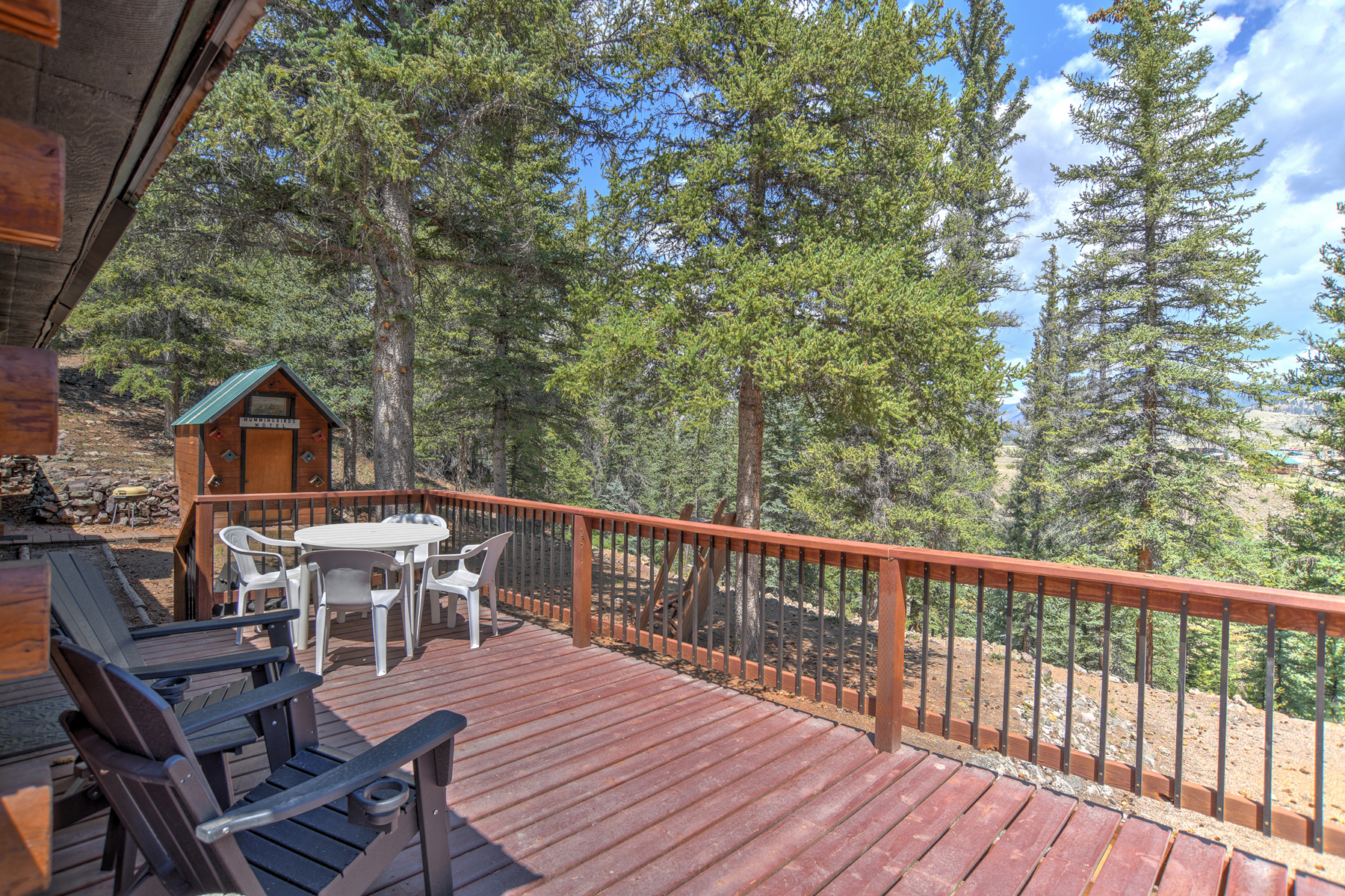 Large deck with mountain and river views. 
