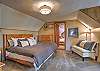 Second-story king bedroom.  Remote workspace and access to the twin bedroom through here. 