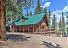 This beautiful mountain cabin sits in the pine trees with the Rio Grande River flowing a short distance away. 