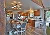 Open kitchen, living room, and dining area.