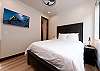 2nd Bedroom - Queen Bed and TV (Main Floor)