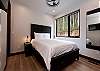 2nd Bedroom - Queen Bed and TV (Main Floor)