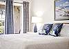 The King Primary Suite includes an ensuite full bathroom, walk-in closet, and Smart TV