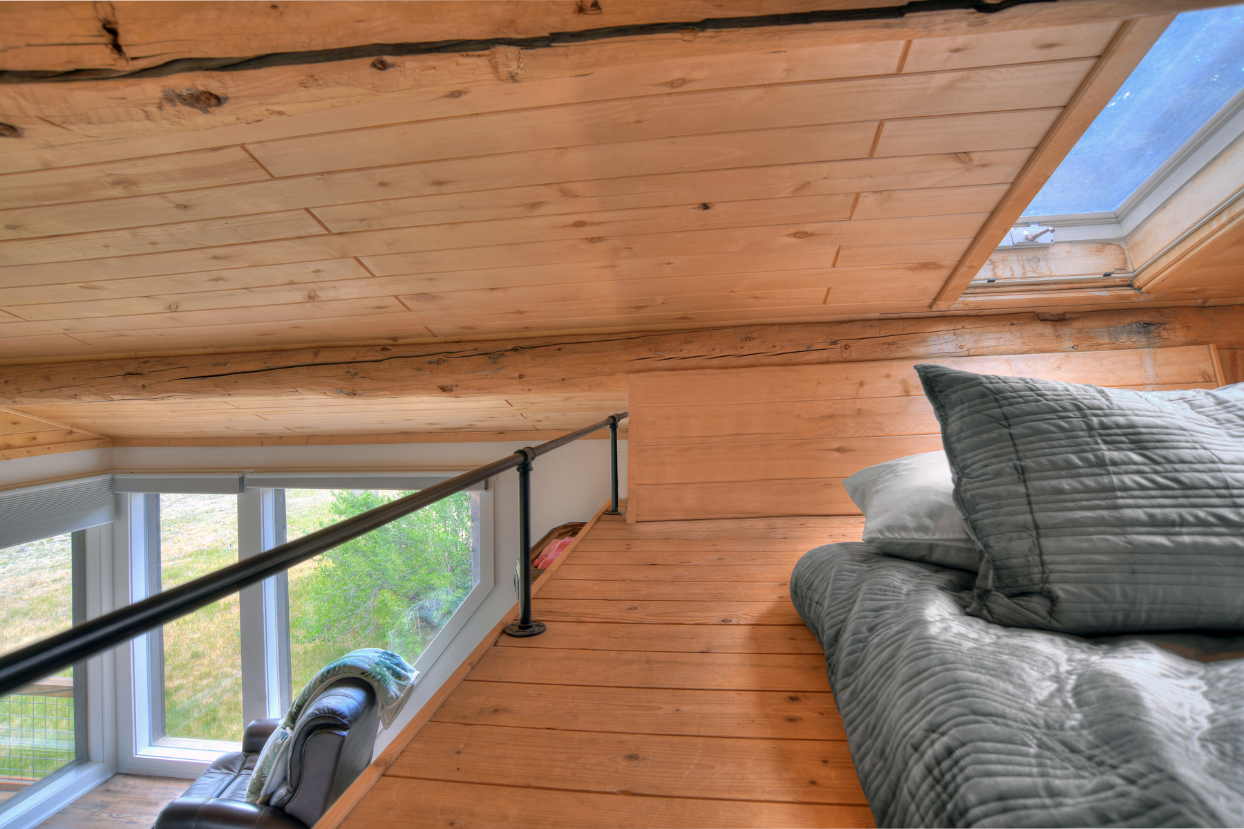 Loft queen bed. Not private and overlooks the main king bedroom.