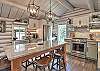 Fully equipped kitchen with stainless steel appliances and granite countertops