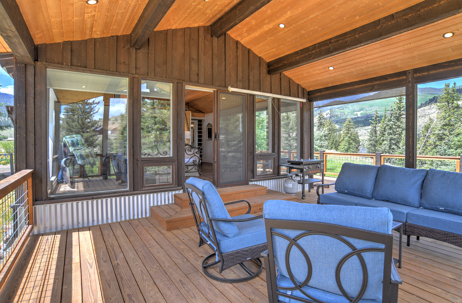 Large deck with mountain and river views. 