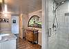 Bathroom with a walk-in shower and soaking tub.