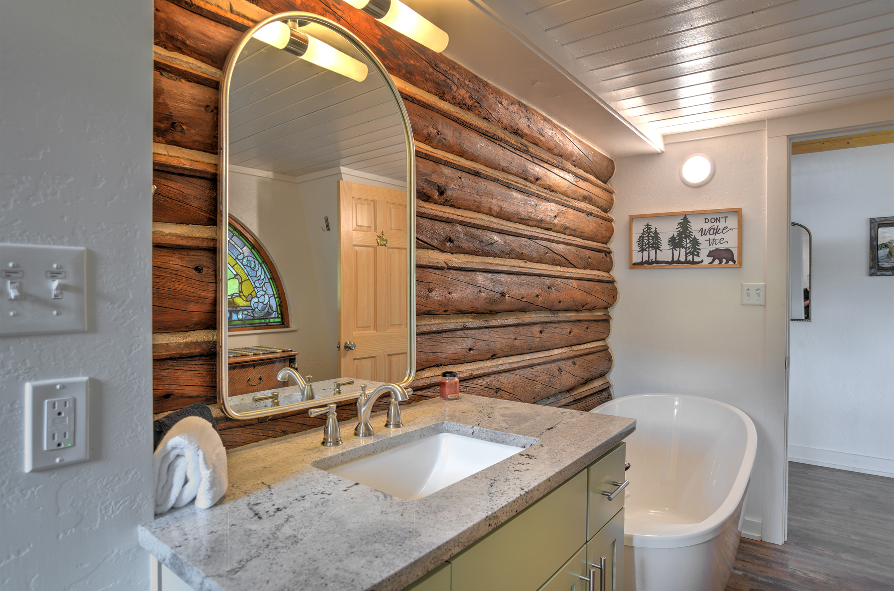 Bathroom with walk-in shower and soaking tub