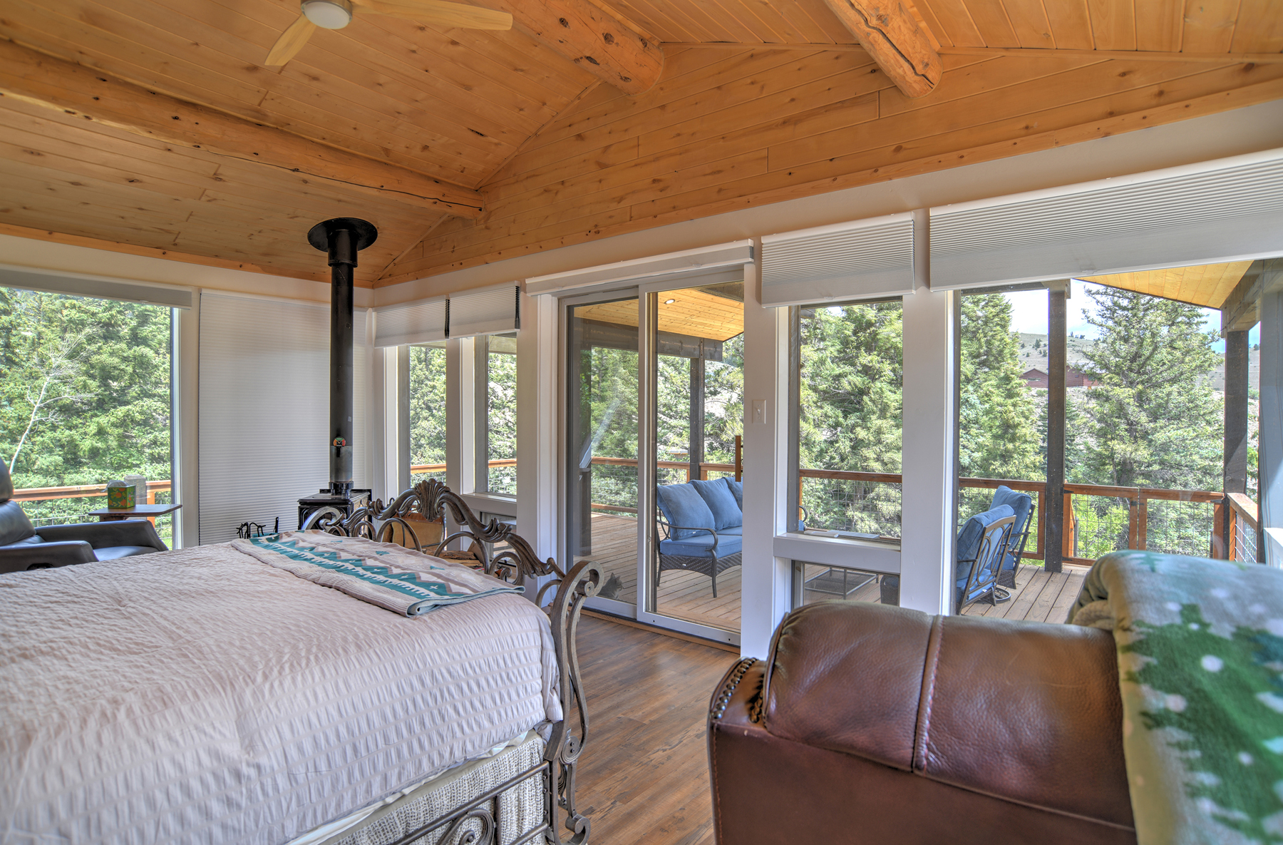 King bedroom with view of the mountains and river