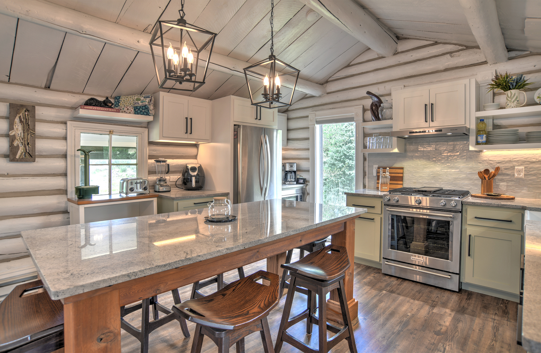 Fully equipped kitchen with stainless steel appliances and granite countertops