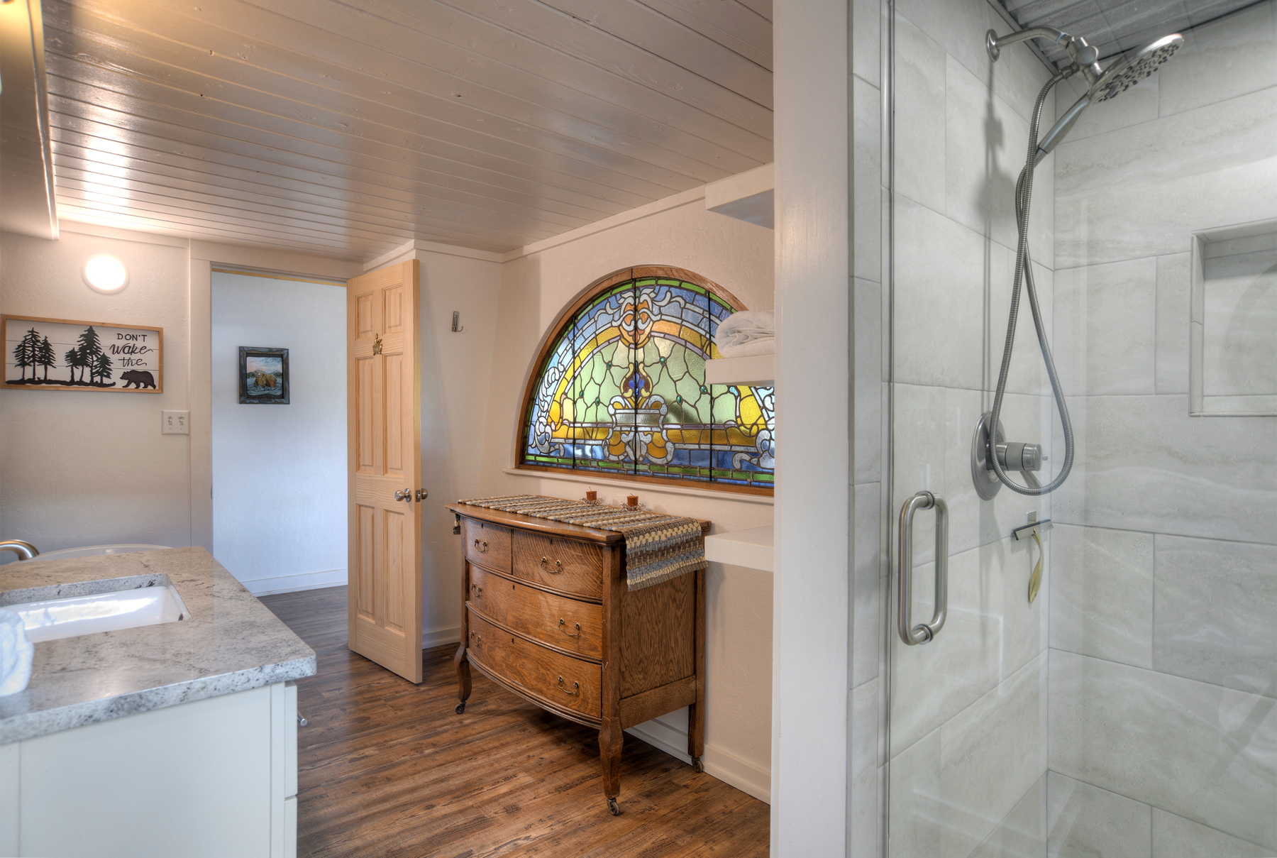 Bathroom with a walk-in shower and soaking tub.