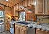 Our galley kitchen is fully equipped with stainless steel appliances and an ice maker.