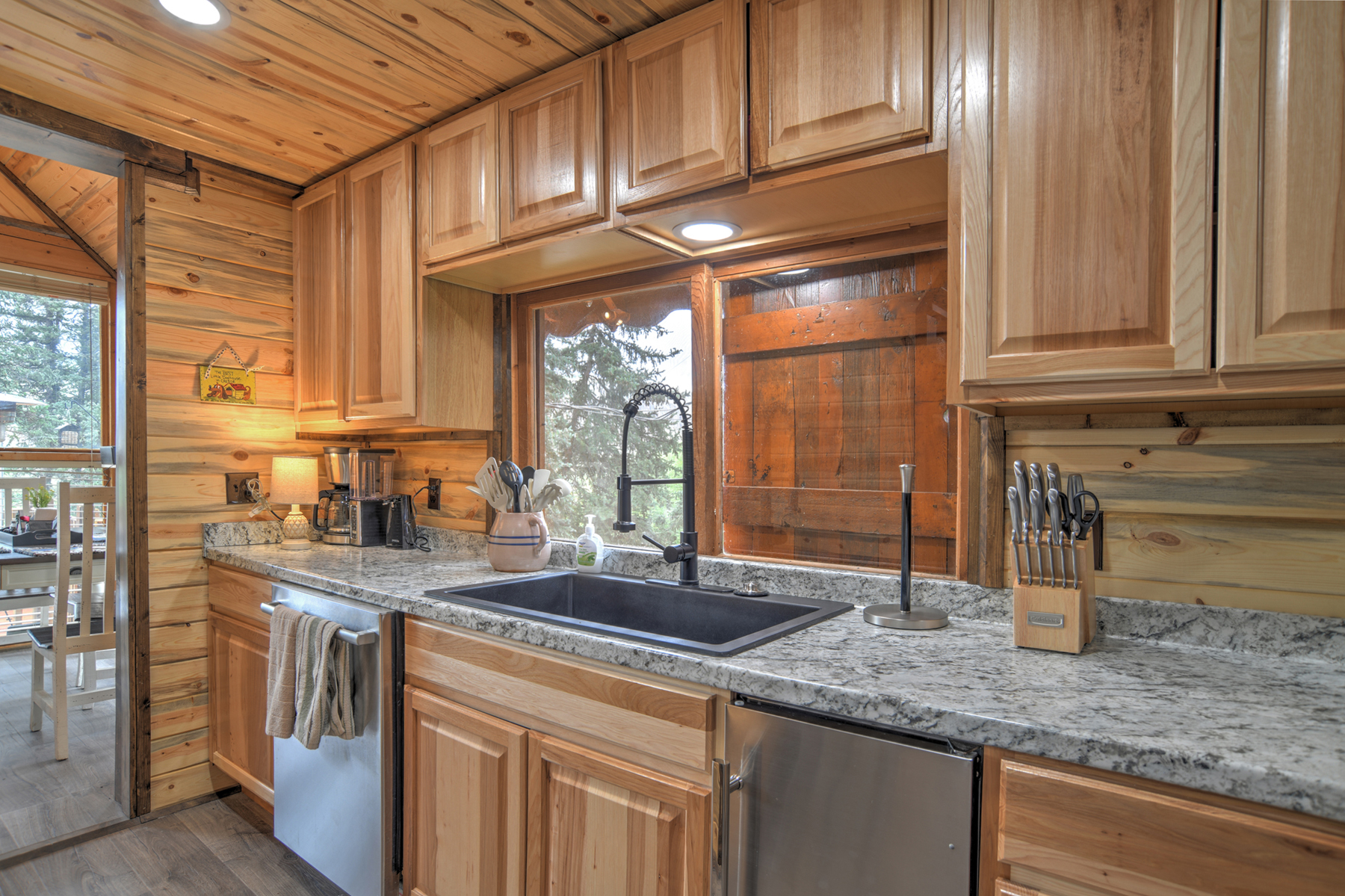 Our galley kitchen is fully equipped with stainless steel appliances and an ice maker.