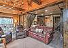 Open dining and living room with Smart TV.  Stunning mountain and river views. 