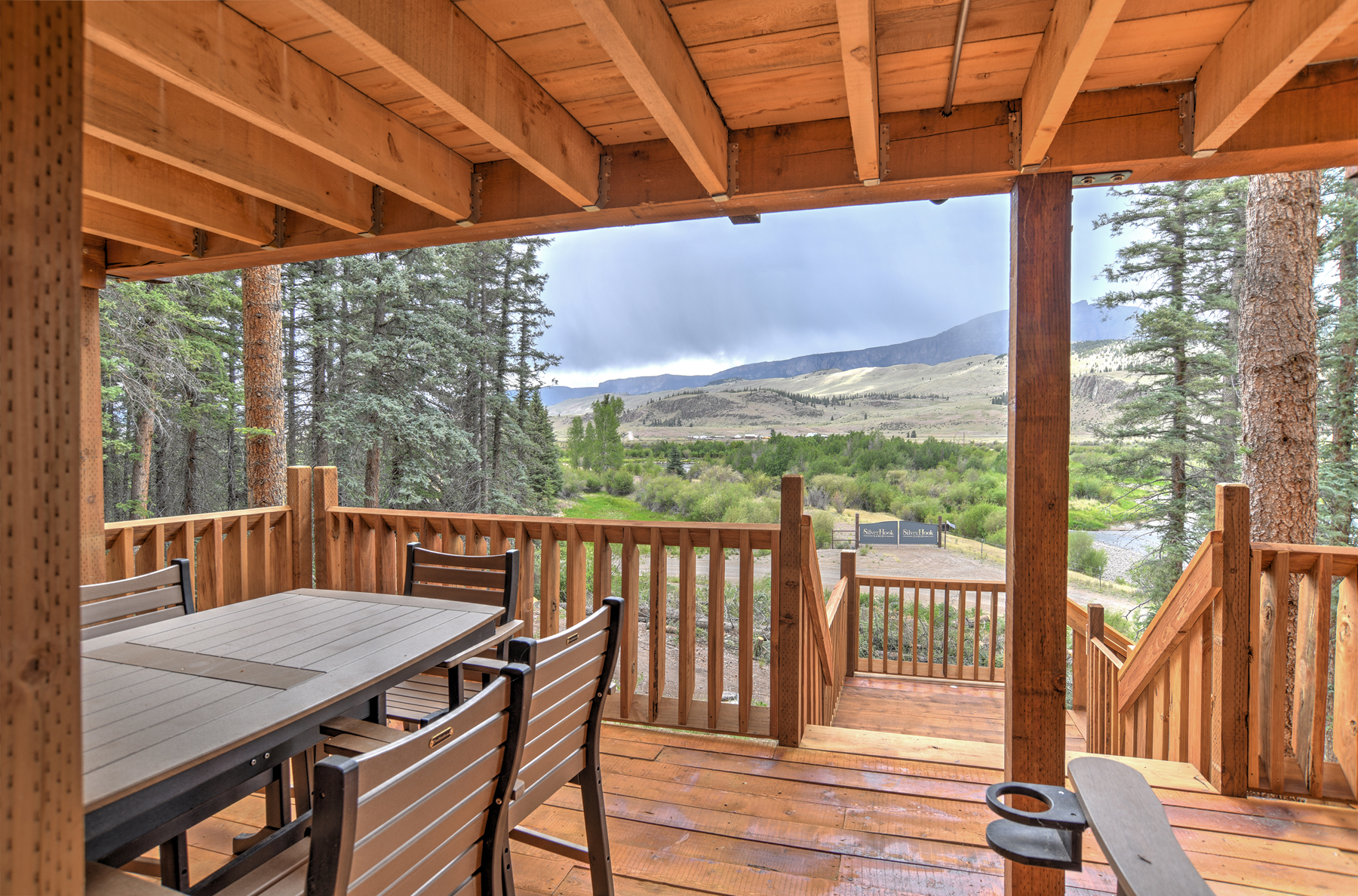 Expansive Deck with stunning mountain and river views. No river access. 