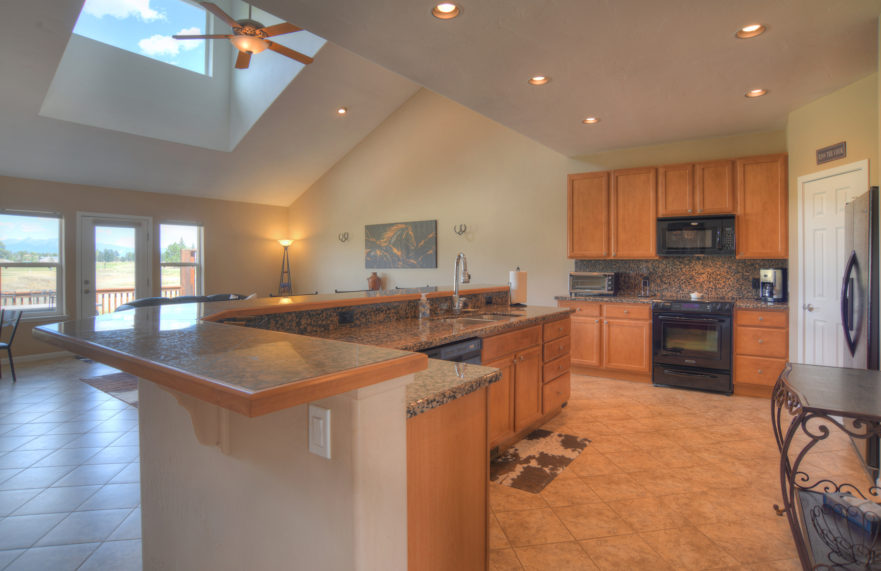 Fully equipped kitchen with pantry.