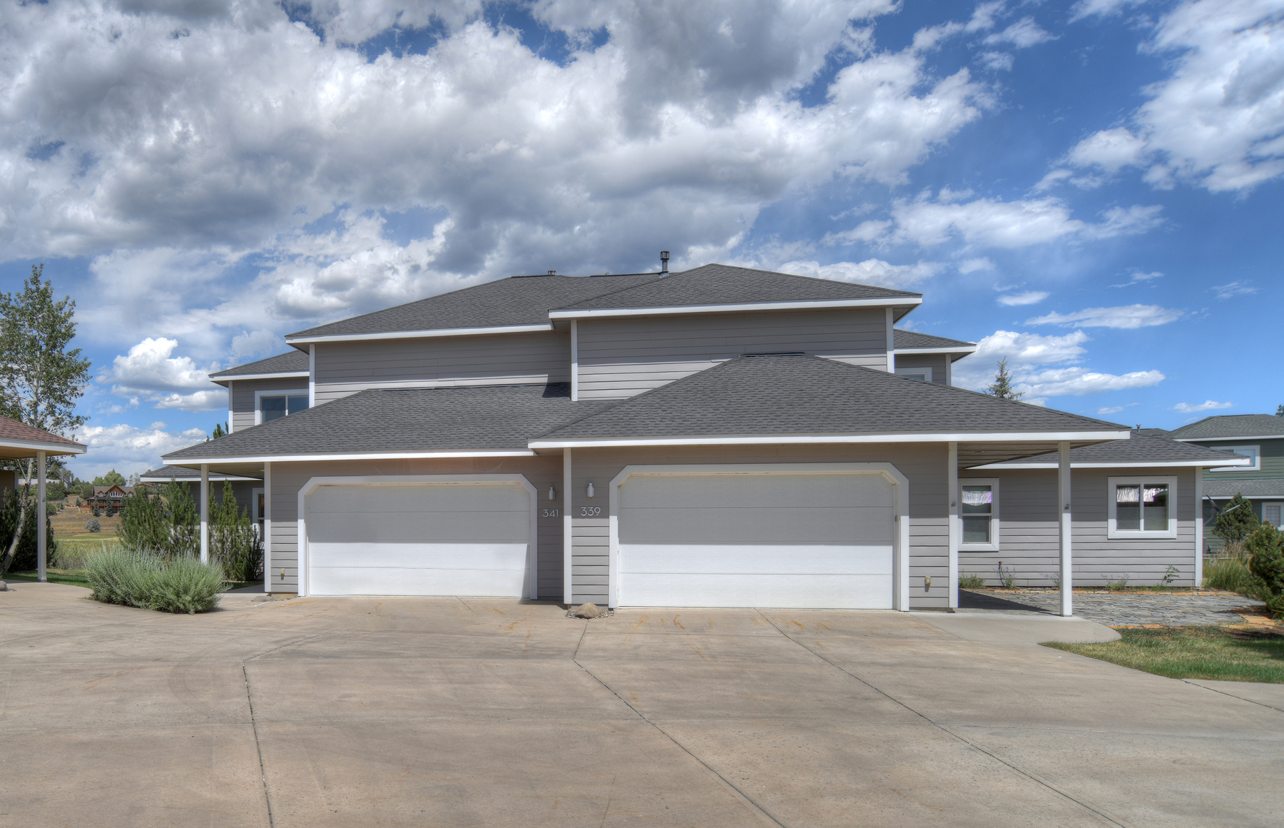 Plenty of space for parking in the driveway and garage.
