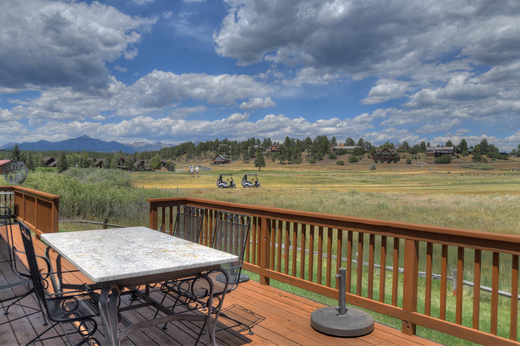 Outdoor entertaining with mountain views, views of the Meadows Course, the 9th hole. Outdoor grill and lots of seating. 
