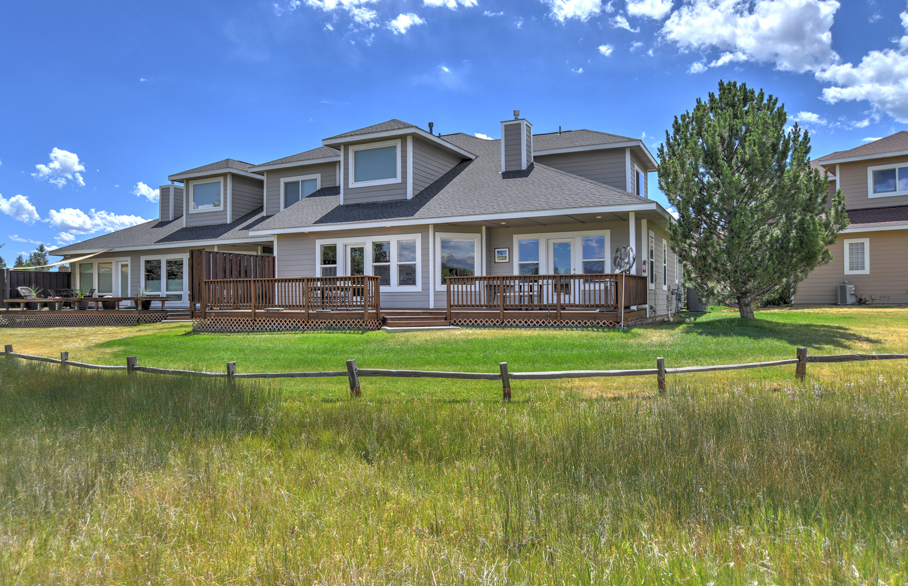Enjoy mountain and golf course views from our expansive outdoor deck. 