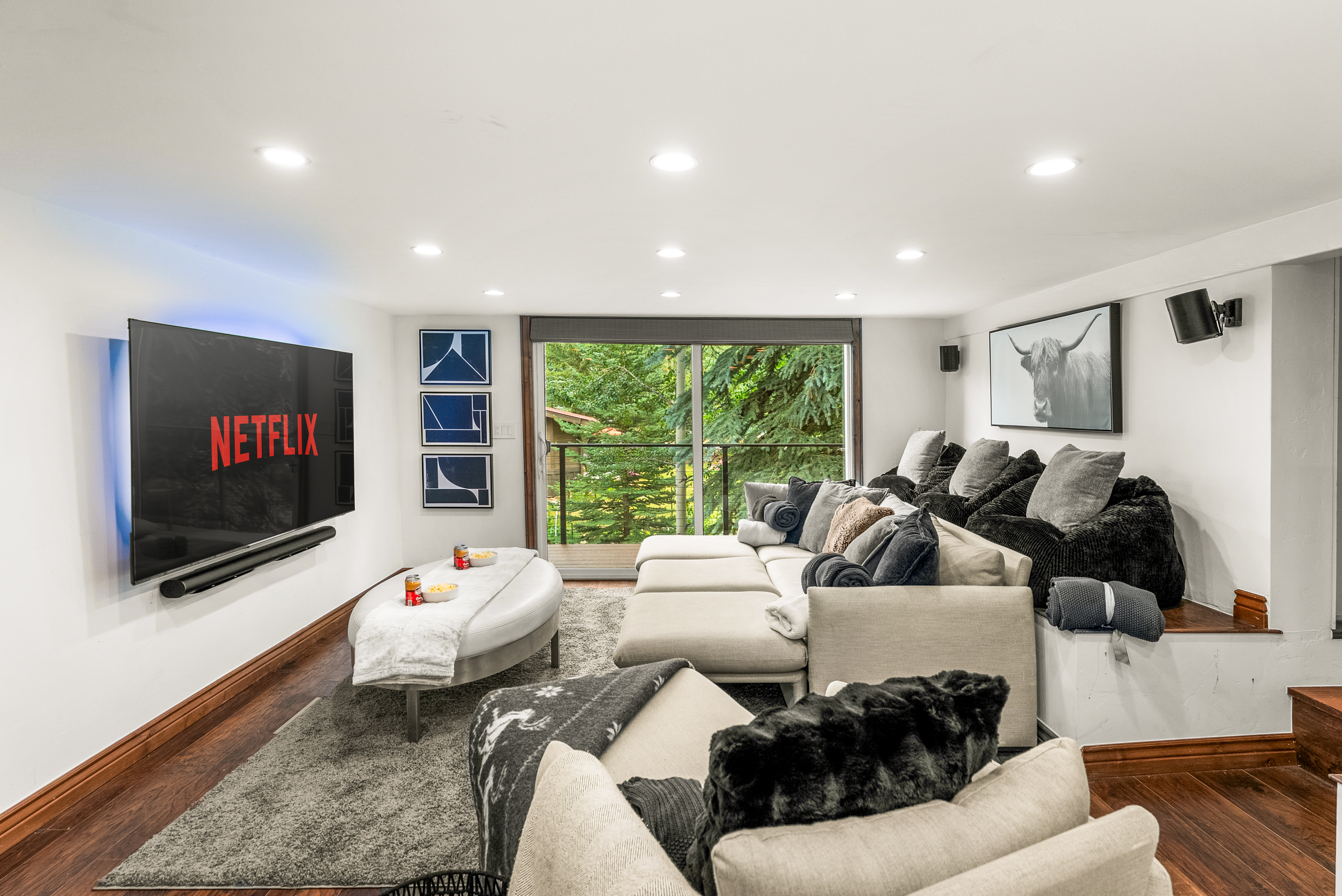 Theatre Room: 80" Smart TV, surround sound, boot warmers, main floor