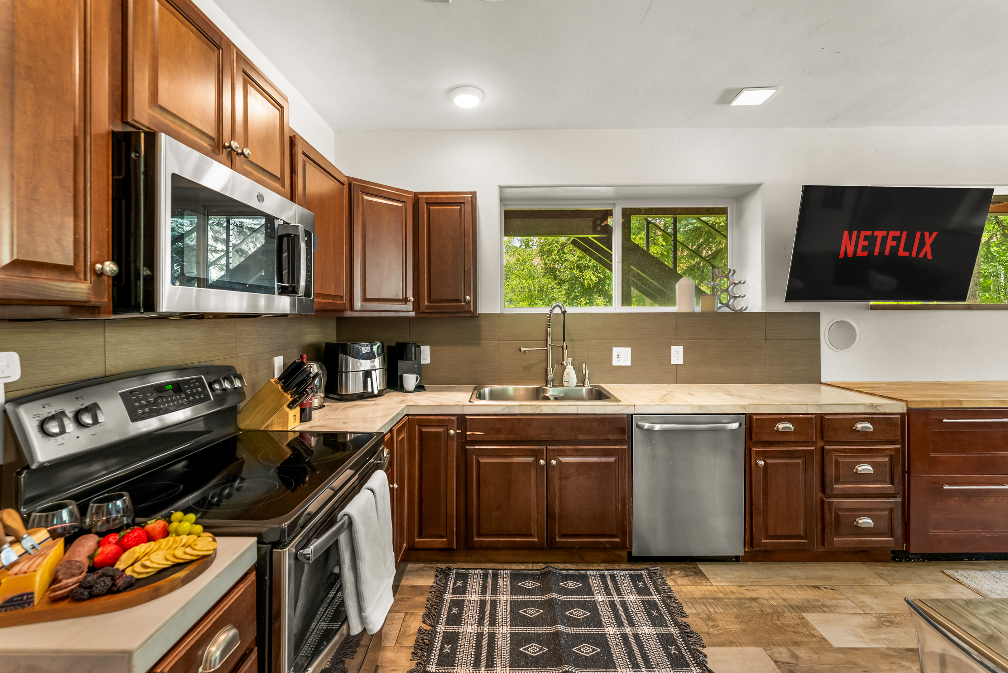 Kitchen 2: Refrigerator, freezer, oven, microwave, Keurig, lower floor