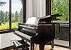 Beautiful piano in main living room area