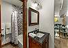 Bathroom 4: Shared bathroom with tub/shower combo, lower floor