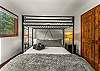 Bedroom 5: Twin-over-queen bunk bed, upper floor