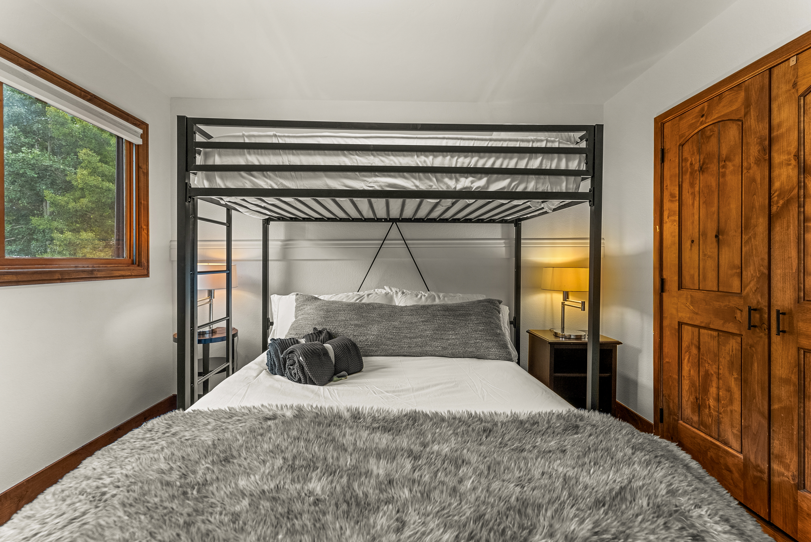 Bedroom 5: Twin-over-queen bunk bed, upper floor
