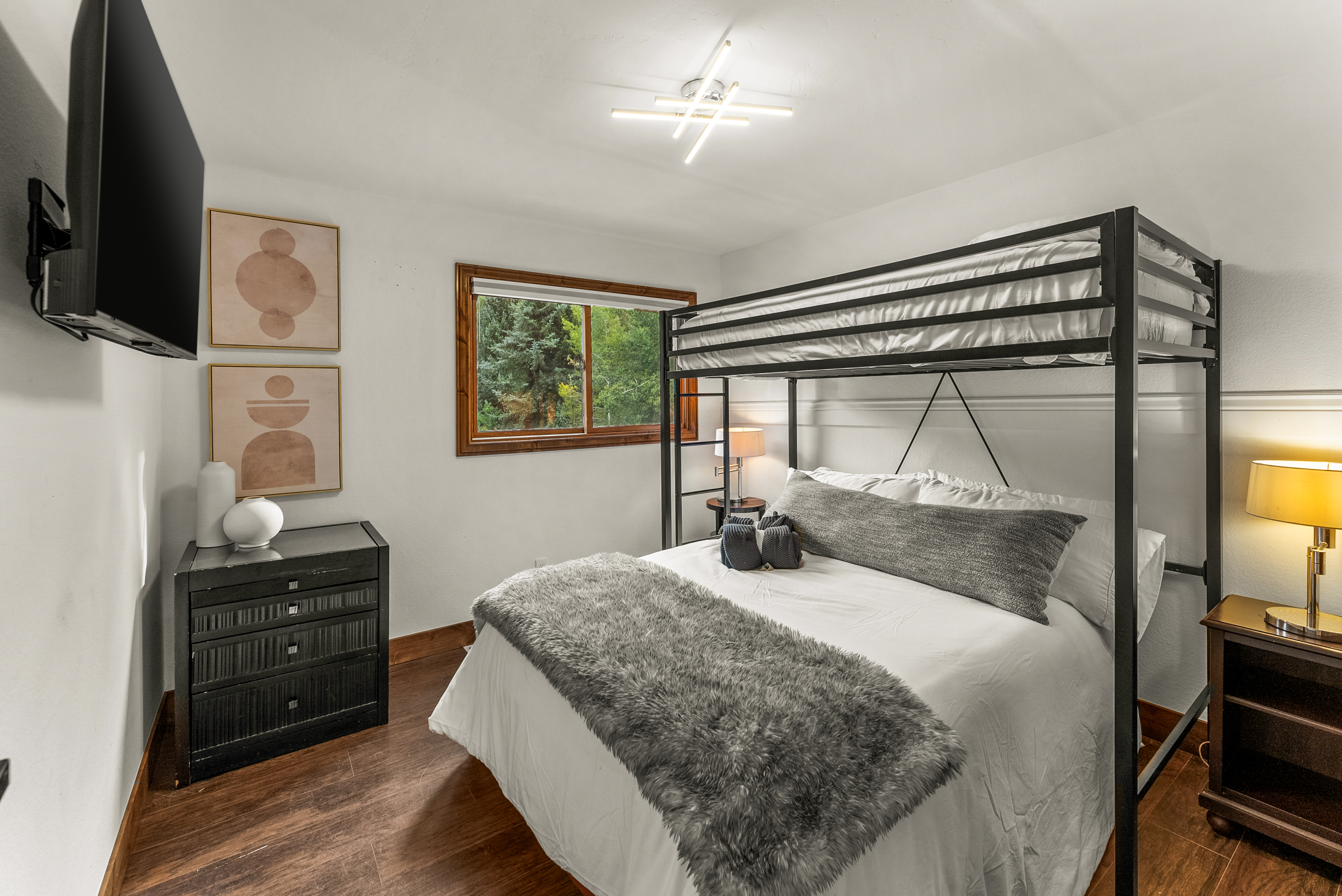 Bedroom 5: Twin-over-queen bunk bed, upper floor