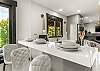 Kitchen: Bar seating for 3