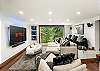 Theatre Room: 80" Smart TV, surround sound, boot warmers, main floor