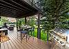 Patio: 8-person private hot tub, gas grill, outdoor gas fireplace, seasonal creek