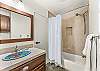 Bathroom 2: Tub, shower, shared upper floor