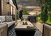 Patio: 8-person private hot tub, gas grill, outdoor gas fireplace, seasonal creek